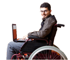 Man who uses wheelchair using a laptop